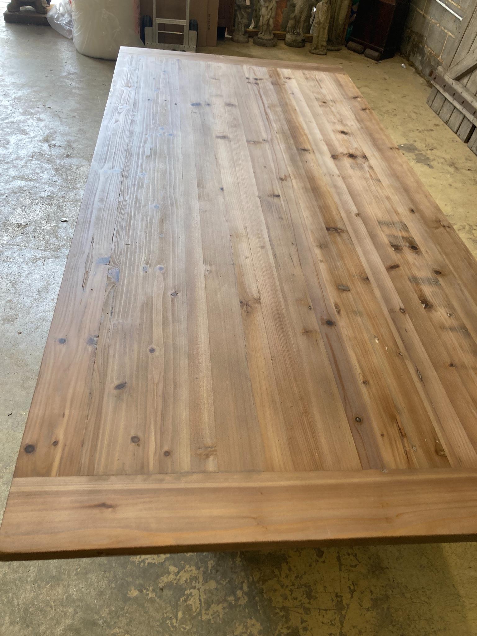 An 18th century style rectangular pine refectory dining table, length 240cm, depth 110cm